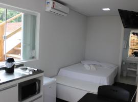 Praia Camburi - Studios Kuta – hotel w mieście Camburi