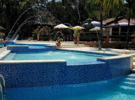 The Log Cab-Inn, resort i San Ignacio