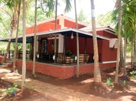 Red Roof Farmhouse, hotel med parkering i Chiplun