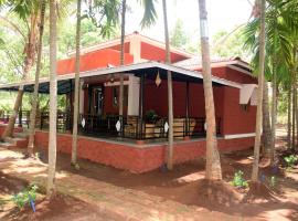 Red Roof Farmhouse, boende med onsen i Chiplun