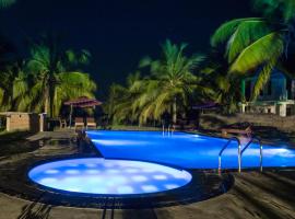 The Coconut Gardens Hotel & Restaurant, отель в городе Тиссамахарама