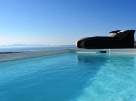 Elysian Santorini, cabaña o casa de campo en Oia