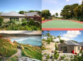 Putsborough Manor 3 Self Catering Cottages with Beach a short walk dog friendly all year, On site Tennis, Play Area, Paddock, Spa baths, BBQ, Private Gardens, Superfast WIFI, hotel with jacuzzis in Croyde