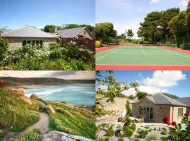 Putsborough Manor 3 Self Catering Cottages with Beach a short walk, dog friendly all year, On site Tennis, Play Area, Paddock, Spa baths, BBQ, Private Gardens, Superfast WIFI