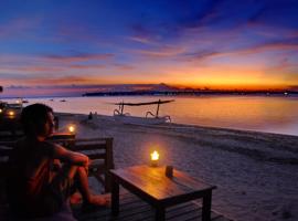 ๊ธธ๋ฆฌ ์์ด๋ฅด์ ์์นํ ํธํ
Matahari Bungalow 3