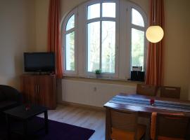 Ferienwohnung Sandrose, מלון בוגנרוגה