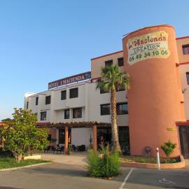 Hôtel L'Hacienda، فندق في مارتيغ