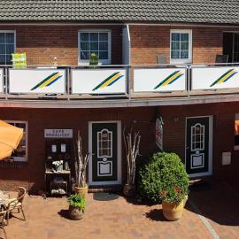 Café Hausnordlicht - Ferienwohnung 2, hotel in Dornum