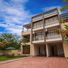 StayVista's Greenwoods Villa 1 - City-Center Villa with Private Pool, Terrace, Lift & Carrom Board