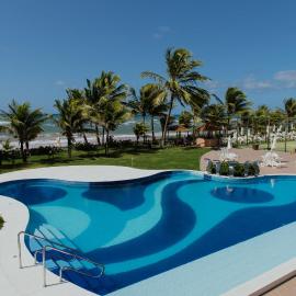 Flat Guarajuba Beira da Praia pé na areia, hótel í Guarajuba