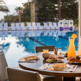 Astral Nirvana Suites- Half Board