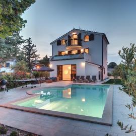 Villa Andrija Family Dream with heated pool at the sea with beautiful garden, outside cinema and kids playground