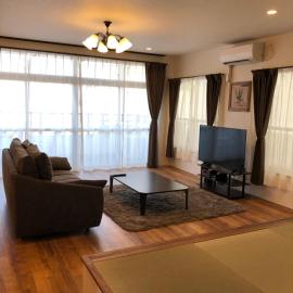 Amami Weekly House Nico Nico Nazeko-ten, hotel en Amami