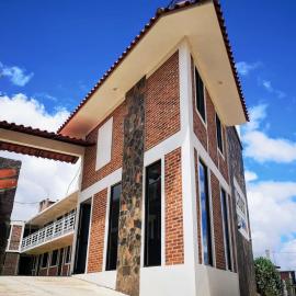 Hotel Tlatoani, готель у місті Чіґнауапан