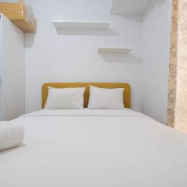 Minimalist Studio at Azalea Suites Cikarang Apartment By Travelio