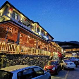 Nanjing Tulou Xinyuan HomeStay، فندق في Bajia
