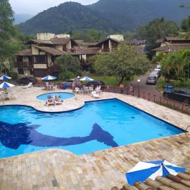 Casa na praia de maresias em condomínio com piscina aquecida na av principal de maresias