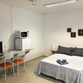 Casa edícula no centro com Smart TV