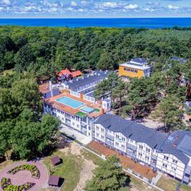 Apartamenty Poddąbek- basen kryty, sauna, animacje dla dzieci , małpi gaj, baseny na dachu, hotel in Poddąbie