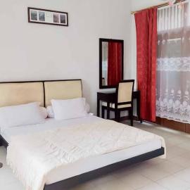 Rumah Pahoman Syariah Mitra RedDoorz, hotel in Geruntang