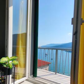 Apartment Noemi with a direct beach view