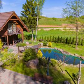 Rustic private Cabin in woods w/ Sauna & Pool, hotel en Vilna