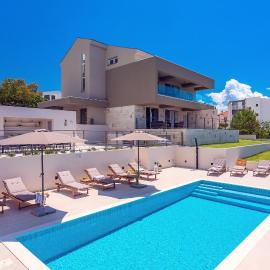 Villa Diva with 7 bedrooms, heated pool, sauna and fun zone, sea views
