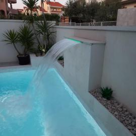 Apartments Benic with a heated pool