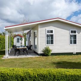 Luxe 5-persoons chalet op familiecamping, hotel di Baarland