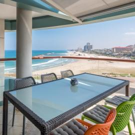 Front of beach next Ritz Hotel