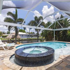 1/2 mile to beach! Heated Pool/Spa, Tiki on boat dock!-Villa Changes in Attitude-Roelens Vacations