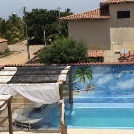 Casa Temporada Frente à Praia Piscina Ar cond Nova Viçosa VA, מלון בנובה ויסוזה
