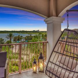 Top floor condo with view of lake, pool and fireworks! Next to Convention Center!