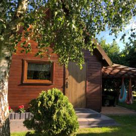 DREWNIANE DOMKI pod brzozami, Hotel in Karwia