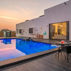 StayVista's Le Bon Horizon - Hillside Elegance with Chic Interiors, Poolside Serenity & Picturesque Gazebo