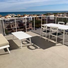 Ático con terraza y vistas al mar - Playa tranquila - Oliva, hotel in Oliva