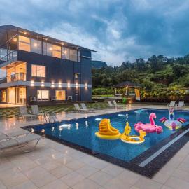 SaffronStays Sundowner - 8BR Morbe-view villa, grand pool, outdoor bar, gazebo, TT & pool table, rain dance, award-winning