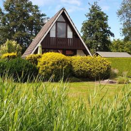 Ferienhaus "Lütte Perle am Deich"