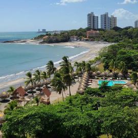 Fantastic Beach condo with pool and mountain views