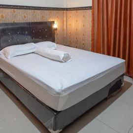 Homestay Singgasana Mitra RedDoorz, viešbutis mieste Girian