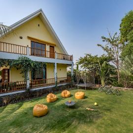 SaffronStays Happy Fields - Swimming pool farmhouse with farm views, hammocks & farm-to-table dining near Pune