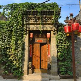 Pingyao Laochenggen Inn, хотел в Пиняо