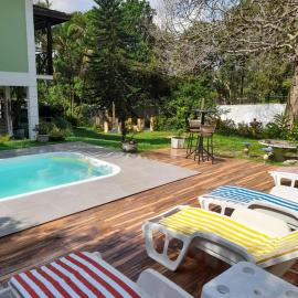 Casa com piscina, espaço gourmet e salão de jogos., hotel em Guapimirim