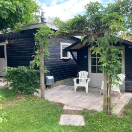 Chalet Wild Forest, knus chalet op de Veluwe met gratis parkeren, ξενοδοχείο σε Putten