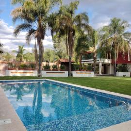 Finca el Nogal - Casa Entera Familiar Moderna con Amplio Jardín Atlixco puebla, хотел в Атлиско
