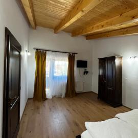 Cabana Mullerhaus, hotel i Tău Bistra