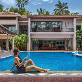 SaffronStays Casa Del Palms - 8BR luxury pool villa with gazebo, pickleball, bar & lawns near Nagaon Beach