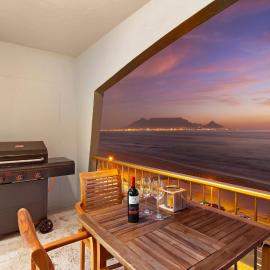 Luxury Beachfront 706 with AC, Workspace & Table Mountain Views
