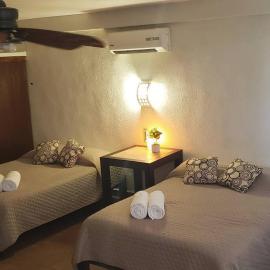 Departamento GRANDE con 2 recamaras con aire 5 camas wifi 115mb, cocina .Cochera techada, #4，巴耶斯城的飯店