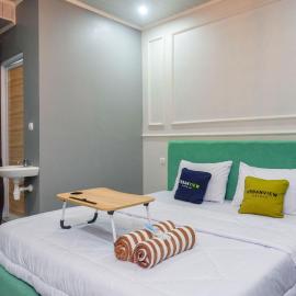 Urbanview Hotel Umbrella Dieng by RedDoorz โรงแรมในKalibeber